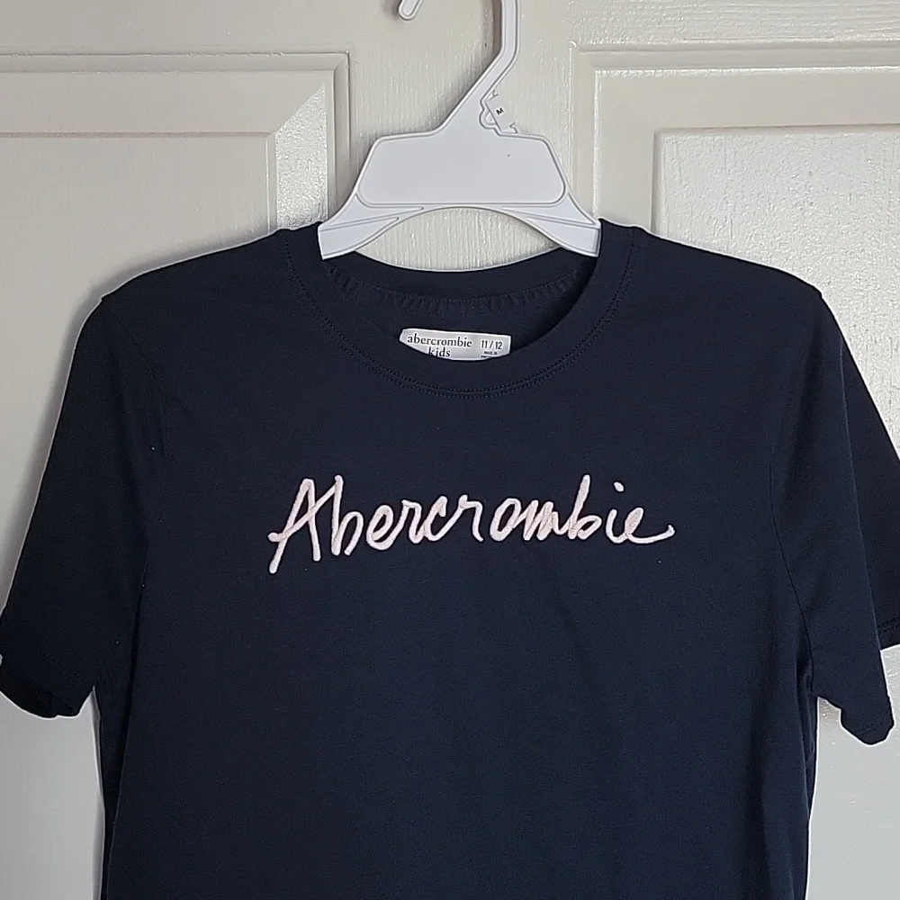 Abercrombie Kids, boys short sleeved blue shirt, 11/12.